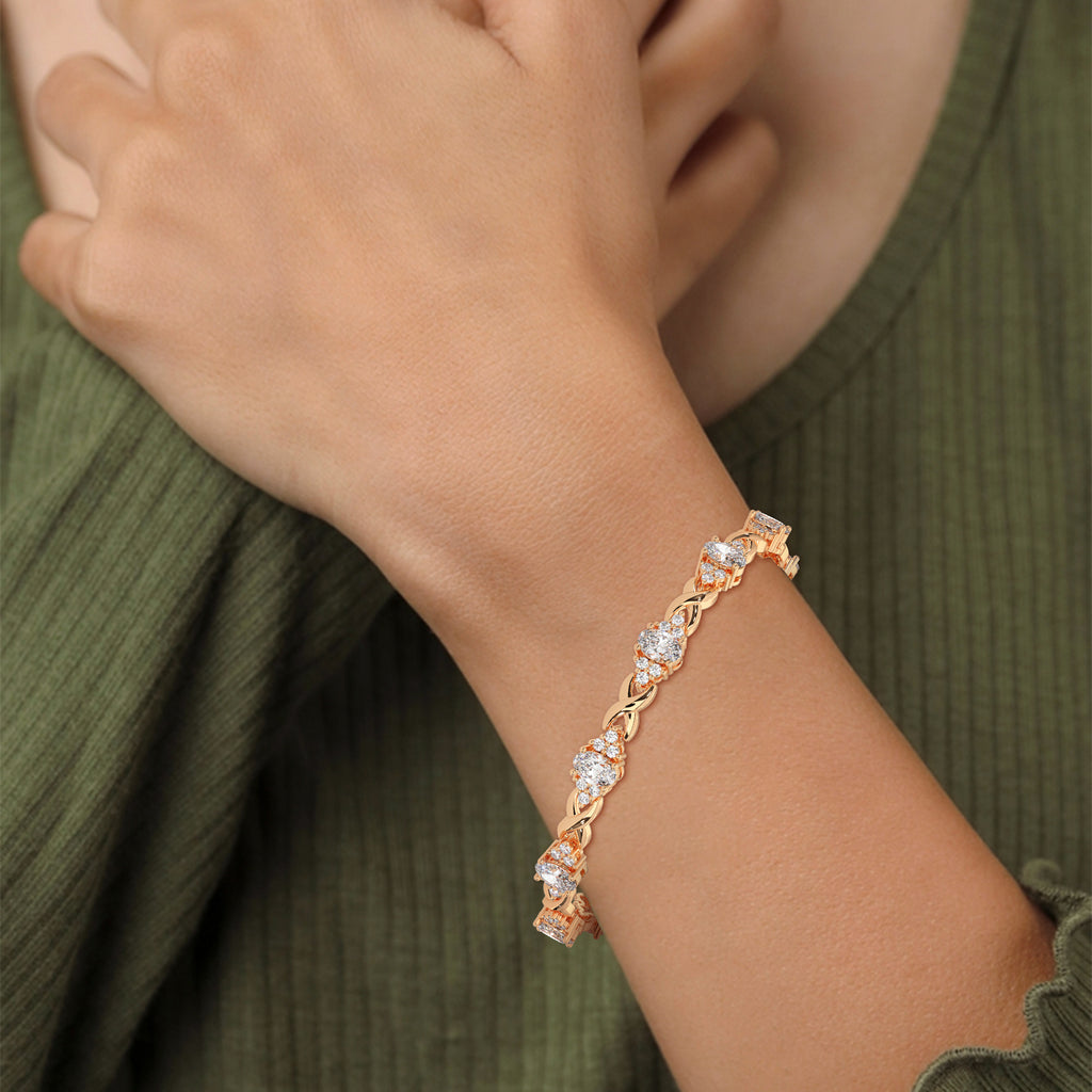 Oval Sapphire & Diamond Infinity Bracelet in rose gold
