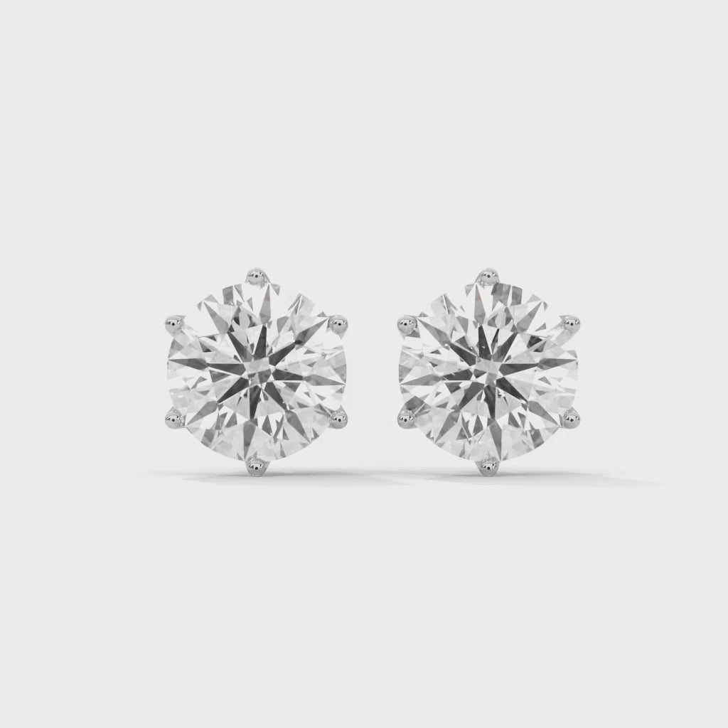 Six-Prong Round Diamond Stud Earrings - white gold video