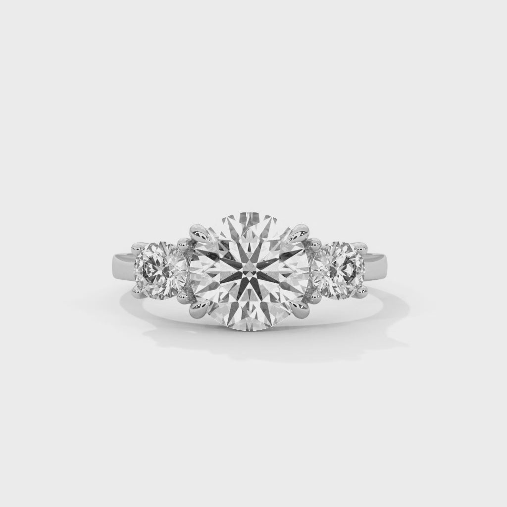 Fleur three-stone round diamond engagement ring, 14k white gold, 360 view
