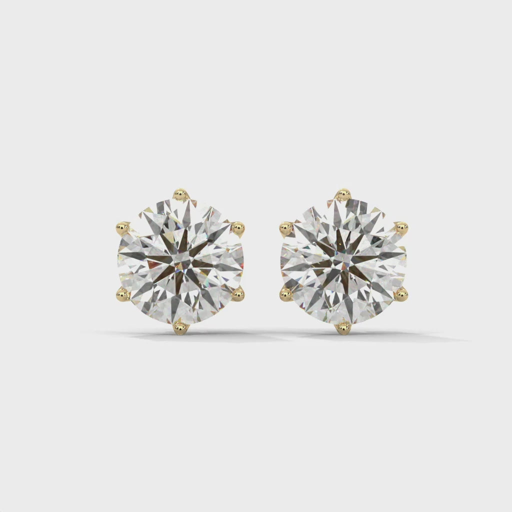 Six-Prong Round Diamond Stud Earrings - yellow gold video