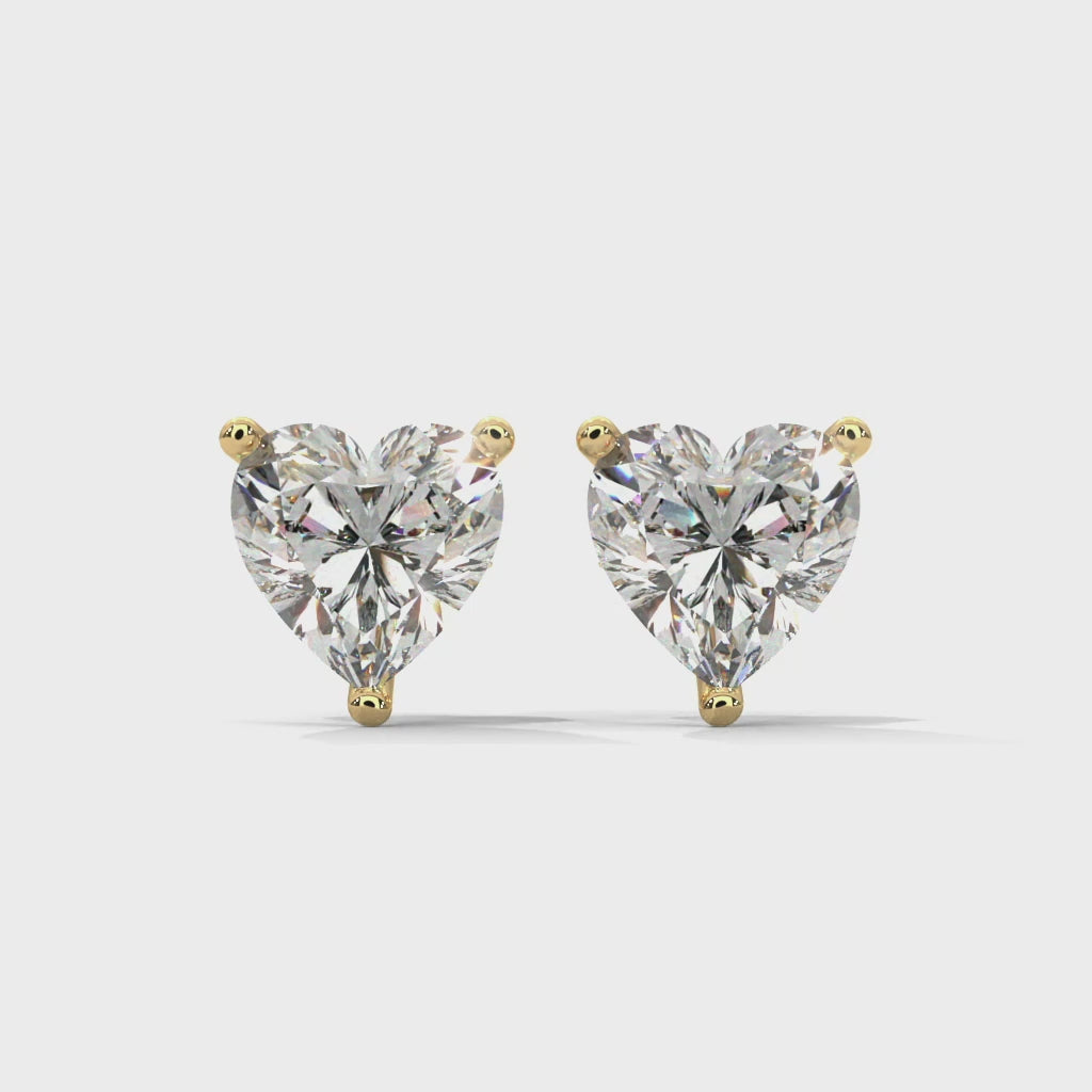 Heart-Cut Diamond Stud Earrings - yellow gold video